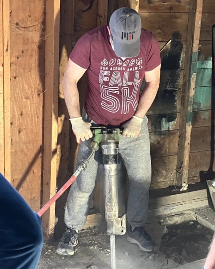 A man using a jackhammer